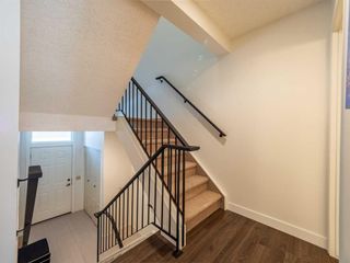 Photo 5: 393 Point Mckay Gardens NW in Calgary: Point McKay Row/Townhouse for sale : MLS®# A2120125
