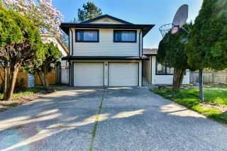 Photo 1: 14512 90 Avenue in Surrey: Bear Creek Green Timbers House for sale : MLS®# R2591638