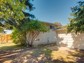 Photo 4: 11036 BRATON Place SW in Calgary: Braeside House for sale : MLS®# C4136035