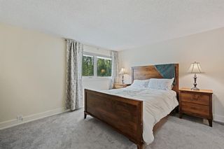 Photo 10: 311 Canterbury Place SW in Calgary: Canyon Meadows Detached for sale : MLS®# A1237569