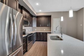 Photo 7: 111 6603 New Brighton Avenue SE in Calgary: New Brighton Apartment for sale : MLS®# A2119890