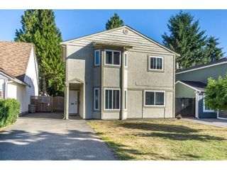 Photo 1: 12477 77A Avenue in Surrey: West Newton House for sale in "Strawberry Hill" : MLS®# R2206395