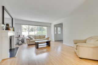 Photo 2: 1030 GATENSBURY Road in Port Moody: Port Moody Centre House for sale : MLS®# R2394825