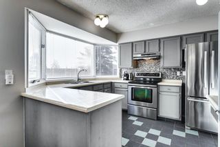 Photo 5: 31 Stradwick Place SW in Calgary: Strathcona Park Semi Detached for sale : MLS®# A1119381