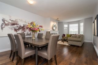 Photo 4: 115 20680 56 Avenue in Langley: Langley City Condo for sale in "CASSOLA COURT" : MLS®# R2243340