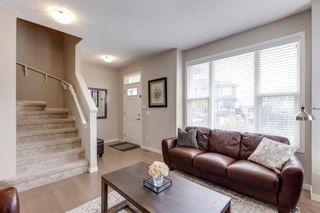 Photo 5: 214 Panatella Walk NW in Calgary: Panorama Hills Row/Townhouse for sale : MLS®# A1225557