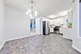 Photo 4: 167 BRIDLEWOOD CM SW in Calgary: Bridlewood House for sale
