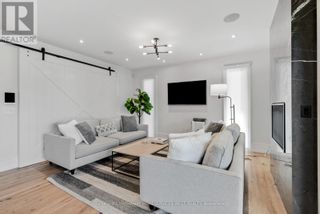 Photo 12: 92 MERVYN AVE in Toronto: House for sale : MLS®# W7310818