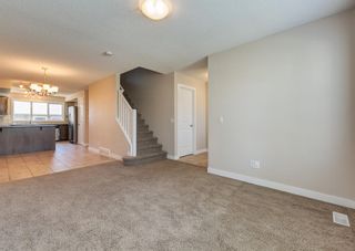 Photo 3: 59 Fireside Parkway: Cochrane Row/Townhouse for sale : MLS®# A2053037