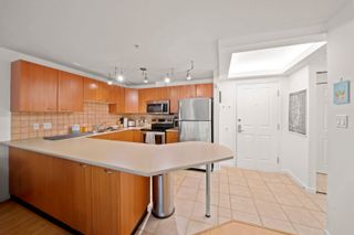 Photo 1: A301 2099 LOUGHEED Highway in Port Coquitlam: Glenwood PQ Condo for sale in "Shaughnessy Square" : MLS®# R2710260