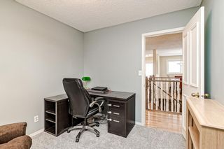 Photo 22: 591 Woodpark Boulevard SW in Calgary: Woodlands Detached for sale : MLS®# A2021172