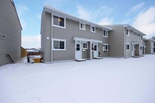 Photo 1: 414 600 Signal Road: Fort McMurray Row/Townhouse for sale : MLS®# A2098653