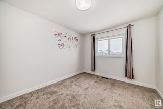 Photo 34: 5705 CAUTLEY Crescent in Edmonton: Zone 55 House Half Duplex for sale : MLS®# E4385289
