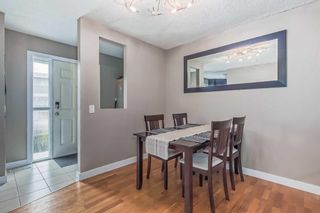 Photo 4: 705 120 Silvercreek Close NW in Calgary: Silver Springs Row/Townhouse for sale : MLS®# A2058224