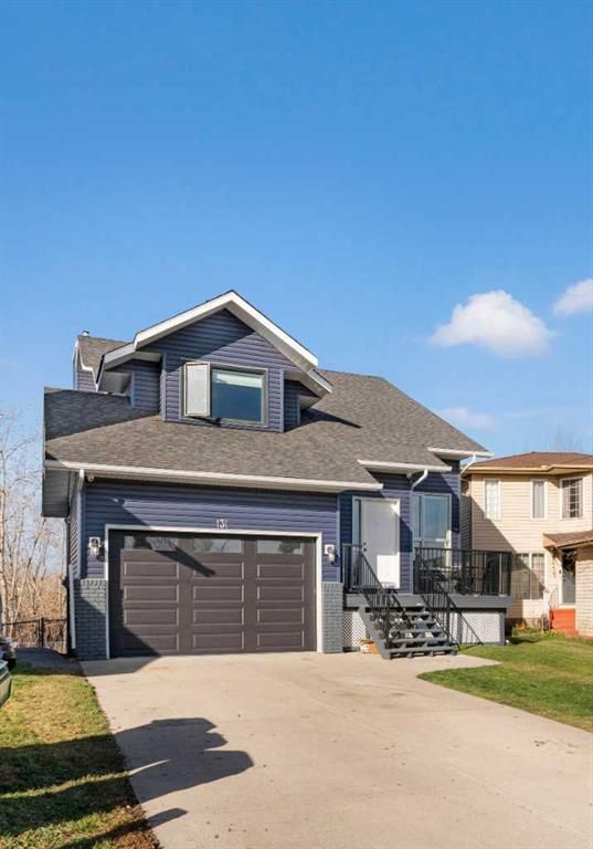 Main Photo: 131 Riverside Way SE in Calgary: Riverbend Detached for sale : MLS®# A2089804