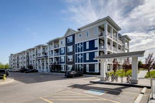 Photo 1: 108 400 Auburn Meadows Common SE in Calgary: Auburn Bay Apartment for sale : MLS®# A1245941