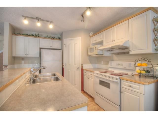 Photo 18: Photos: 16118 EVERSTONE Road SW in Calgary: Evergreen House for sale : MLS®# C4085775