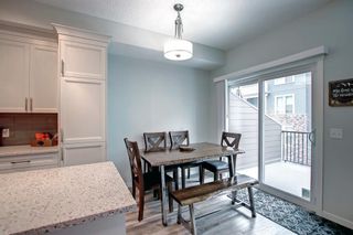 Photo 11: 671 101 Sunset Drive: Cochrane Row/Townhouse for sale : MLS®# A2010546
