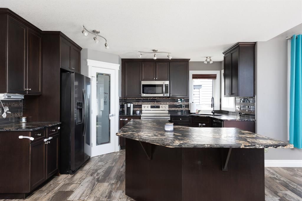 Kitchen with leather finish granite countertops