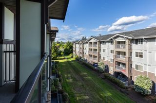 Photo 33: 406 2038 SANDALWOOD Crescent in Abbotsford: Central Abbotsford Condo for sale in "Element" : MLS®# R2880696