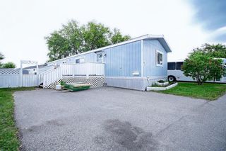 Photo 1: 93 6724 17 Avenue SE in Calgary: Red Carpet Mobile for sale : MLS®# A1232410