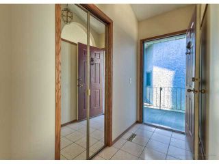 Photo 2: 723 WOODBINE Boulevard SW in CALGARY: Woodbine Residential Attached for sale (Calgary)  : MLS®# C3584095