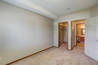 Photo 19: 103 72 Quigley Drive: Cochrane Apartment for sale : MLS®# A1149156