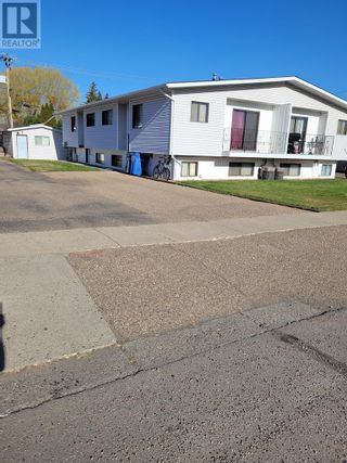 Photo 2: 2206, 15 Ave in Medicine Hat: Multi-family for sale : MLS®# A2044976