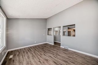 Photo 5: 111 Pinemill Mews NE in Calgary: Pineridge Detached for sale : MLS®# A2115447