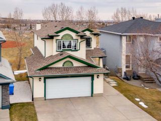 Photo 1: 384 Hidden Ranch Circle NW in Calgary: Hidden Valley Detached for sale : MLS®# A1209302