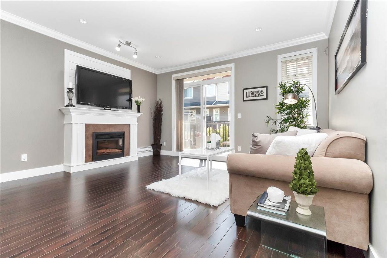 Main Photo: 75 6383 140 Street in Surrey: Sullivan Station Townhouse for sale in "PANORAMA WEST VILLAGE" : MLS®# R2303628