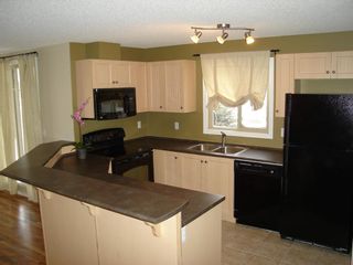 Photo 4: 3102 60 Panatella Street NW in Calgary: Panorama Hills Apartment for sale : MLS®# A1192092