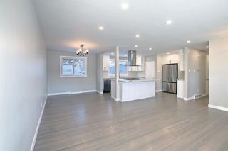 Photo 10: 102 Winston Drive SW in Calgary: Westgate Detached for sale : MLS®# A2012680