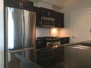 Photo 2: 217 20068 FRASER Highway in Langley: Langley City Condo for sale in "Varsity" : MLS®# R2168601