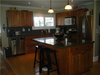 Photo 3: 1345 COTTONWOOD CR in North Vancouver: Norgate House for sale : MLS®# V1008223