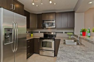 Photo 16: 3071 WINDSONG Boulevard SW: Airdrie Row/Townhouse for sale : MLS®# C4300138