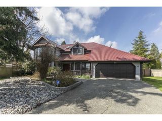 Photo 2: 7549 150A Street in Surrey: East Newton House for sale in "Chimney Hills" : MLS®# R2561314