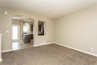 Photo 4: 33 Ross Close: Sylvan Lake Row/Townhouse for sale : MLS®# A1239323