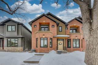 Photo 1: 620 25 Avenue NW in Calgary: Mount Pleasant Semi Detached (Half Duplex) for sale : MLS®# A2029192
