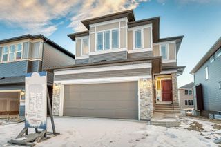 Photo 1: 101 Creekside Way SW in Calgary: C-168 Detached for sale : MLS®# A2017729