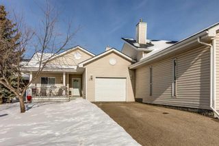 Photo 1: 216 Centre Avenue W: Airdrie Row/Townhouse for sale : MLS®# A2113481
