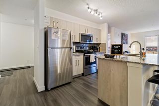 Photo 5: 1316 4641 128 Avenue NE in Calgary: Skyview Ranch Apartment for sale : MLS®# A2004959