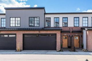 Photo 1: 215 7820 Spring Willow Drive SW in Calgary: Springbank Hill Row/Townhouse for sale : MLS®# A2126081