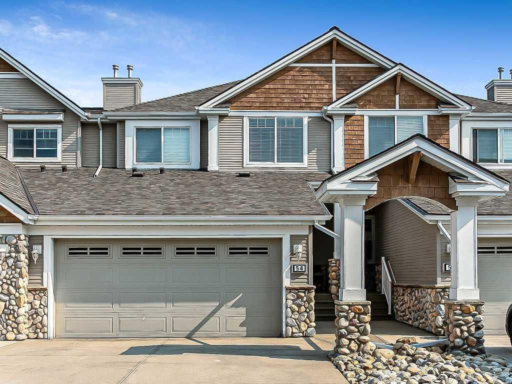 Main Photo: 54 Discovery Heights SW in Calgary: Discovery Ridge Row/Townhouse for sale : MLS®# A2076009