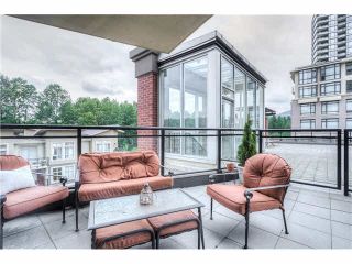 Photo 1: 306 400 CAPILANO Road in Port Moody: Port Moody Centre Condo for sale in "ARIA II AT SUTTERBROOK" : MLS®# V1126880