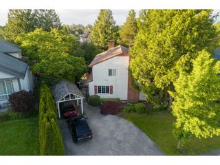 Photo 1: 27005 26A AVENUE in Langley: House for sale : MLS®# R2879317