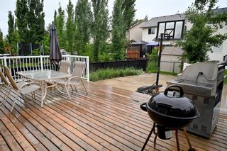 Photo 5: 90 Cougarstone Close SW in Calgary: Cougar Ridge Detached for sale : MLS®# A2145851