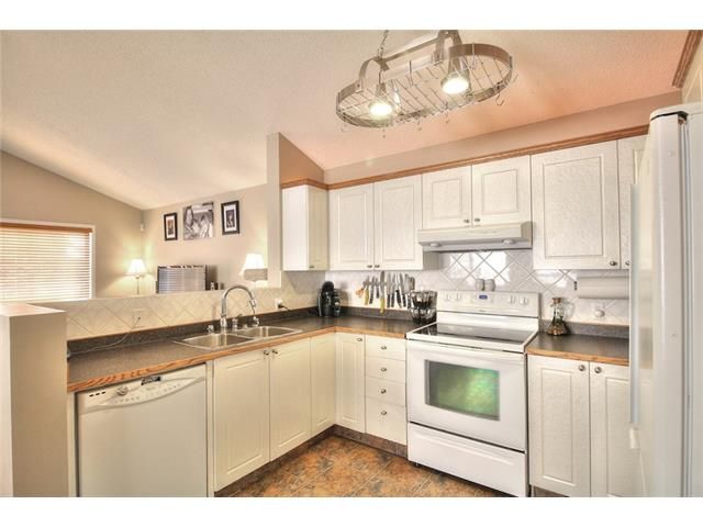Photo 10: Photos: 89 BRIDLEWOOD Park SW in Calgary: Bridlewood House for sale : MLS®# C4033119