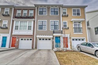 Photo 2: 571 Sherwood Boulevard NW in Calgary: Sherwood Row/Townhouse for sale : MLS®# A1182579