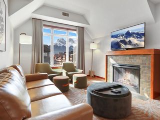 Photo 1: 405 170 Kananaskis Way: Canmore Apartment for sale : MLS®# A2037189